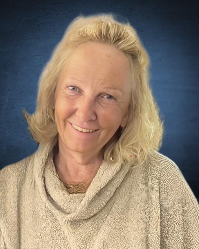 Mme Réjeanne DIONNE